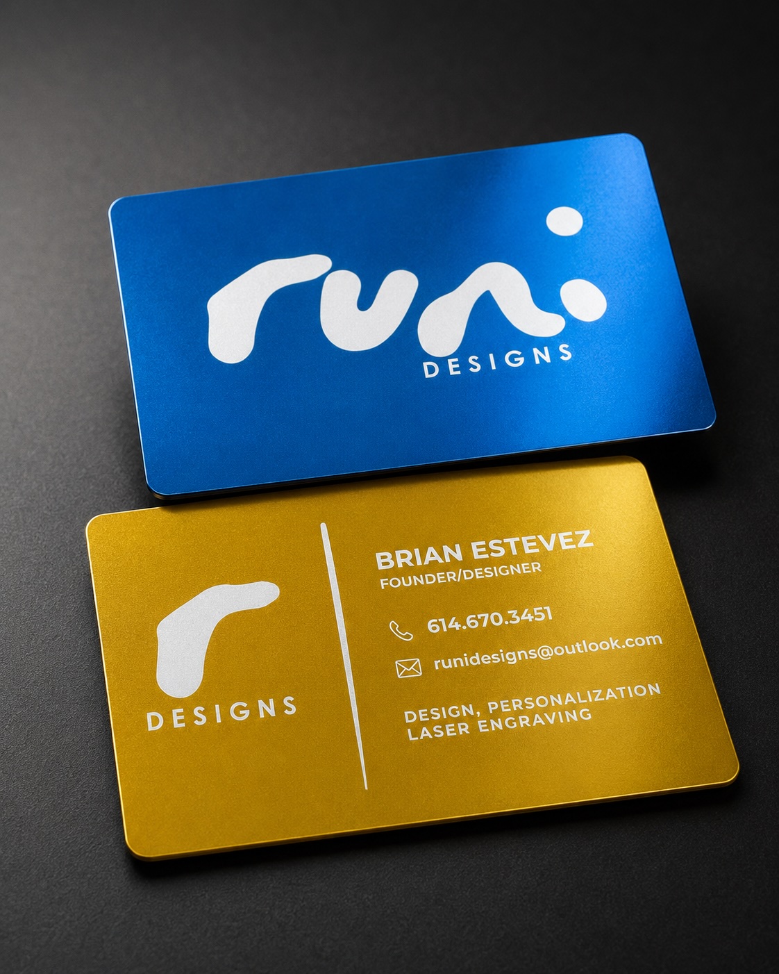 Custom engraved metal business cards by Runi Designs